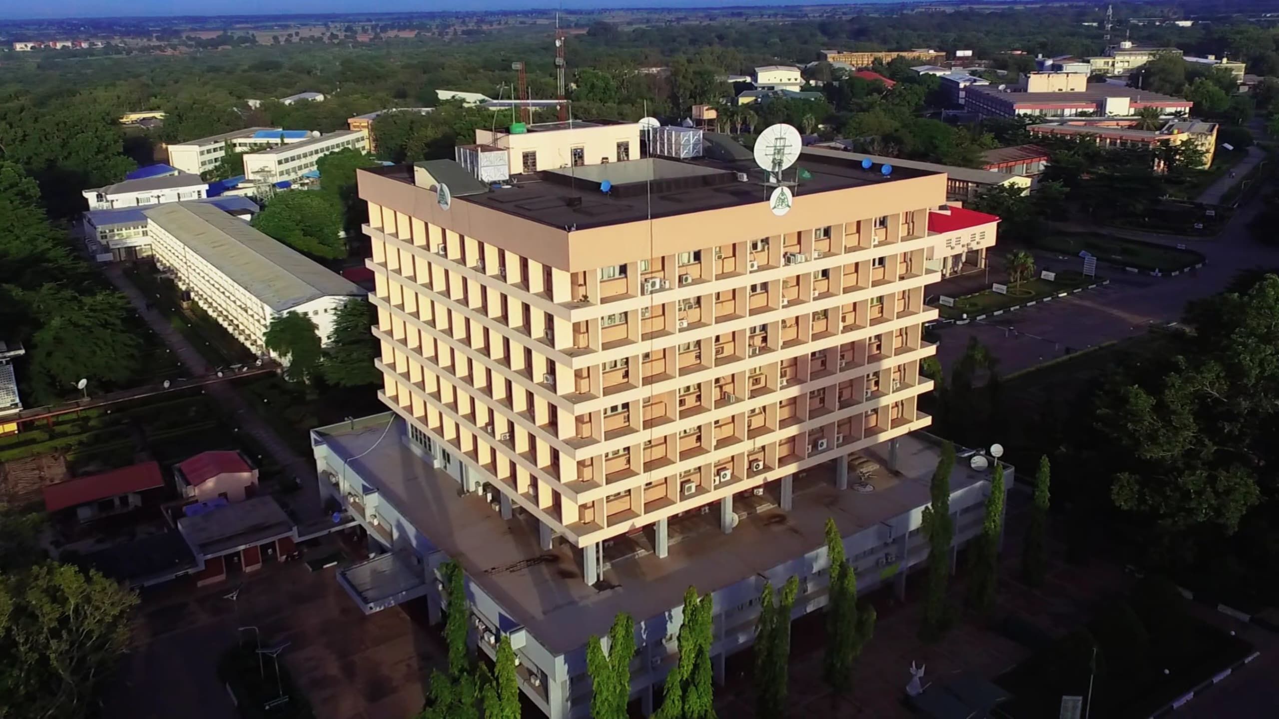 The Senate building of Ahmadu Bello University at dusk, seen from the air